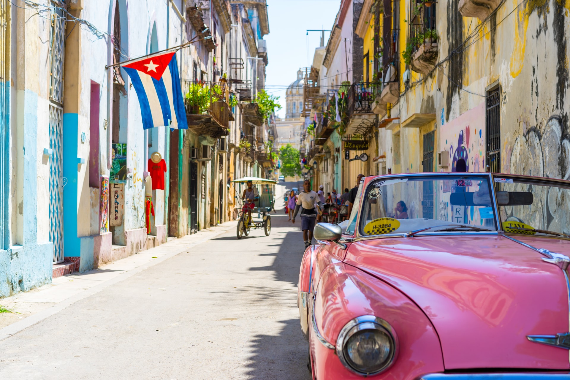 cuban street and flag