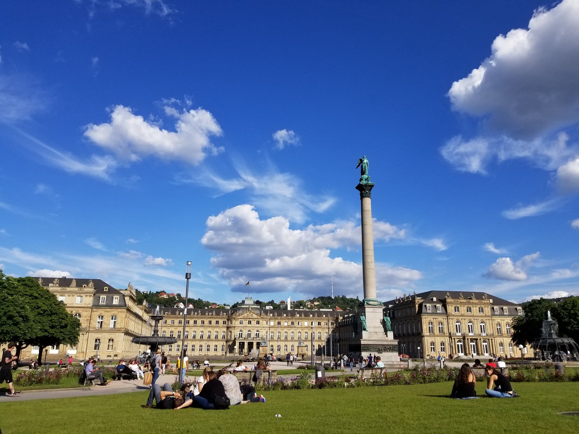 People sitting on the grass in a park in Germany 