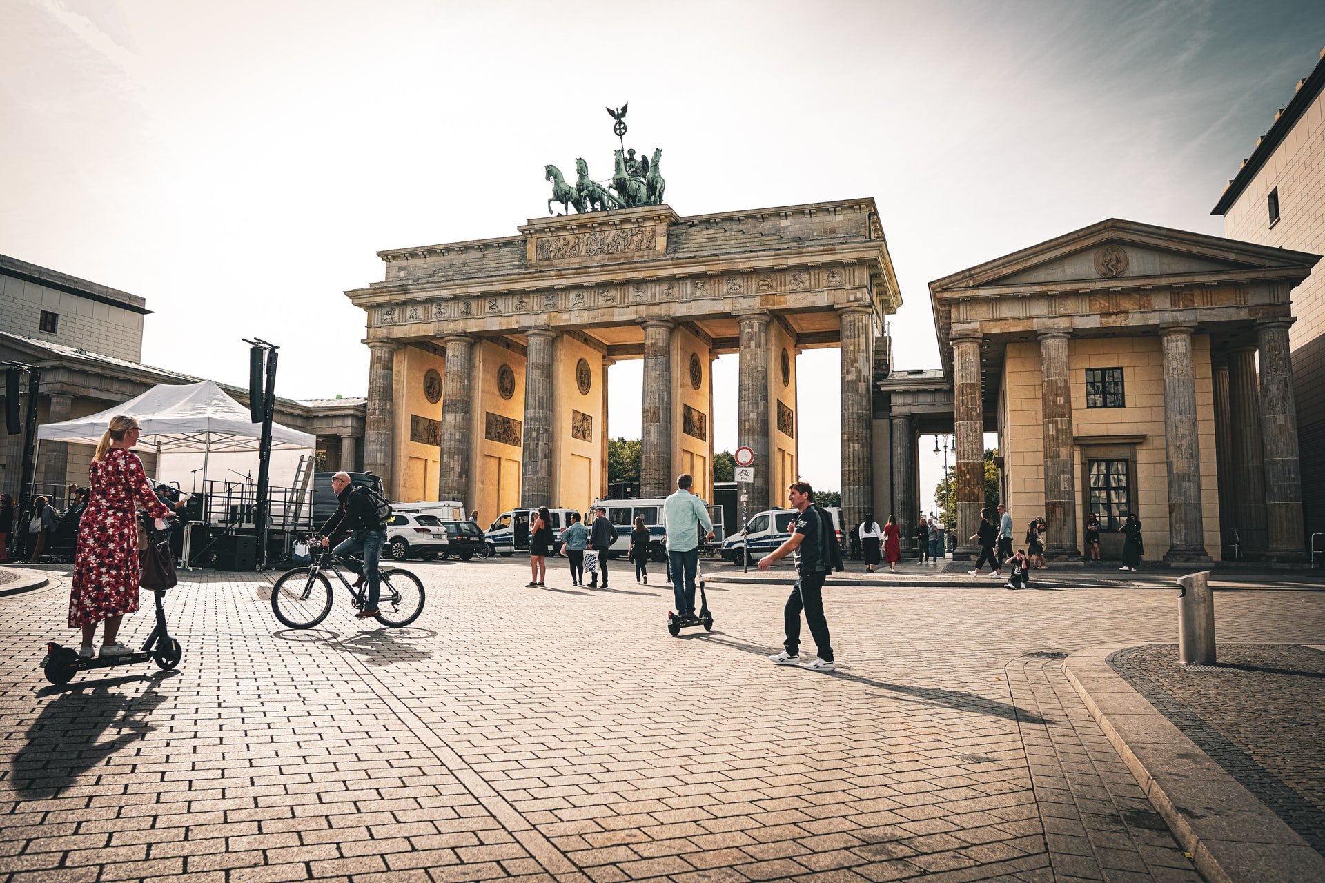 Pedestrians milling around in front of Brandeburg Gate, Berlin, Germany 