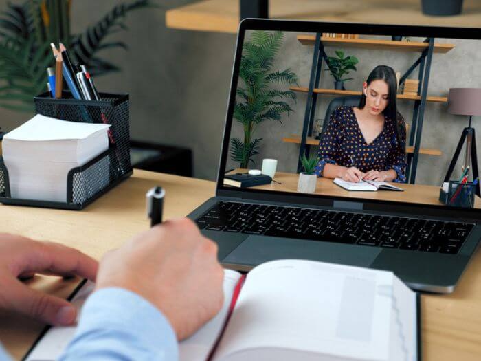 online teacher and online student taking notes