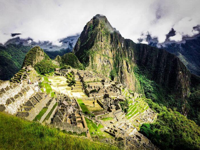 a stone ruins on a mountain