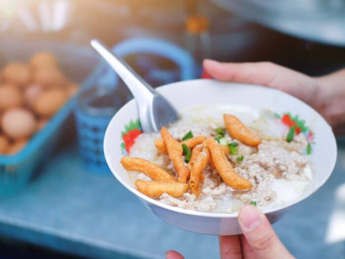 Chinese rice porridge with deep-fried dough sticks