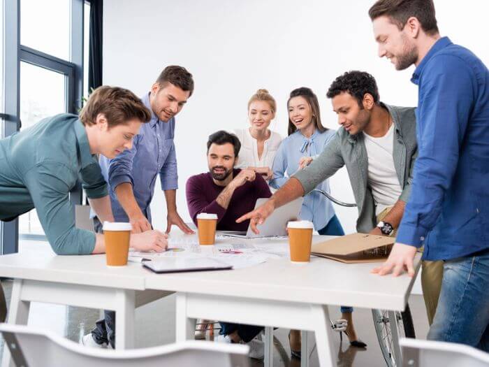 Group of colleagues brainstorming together 