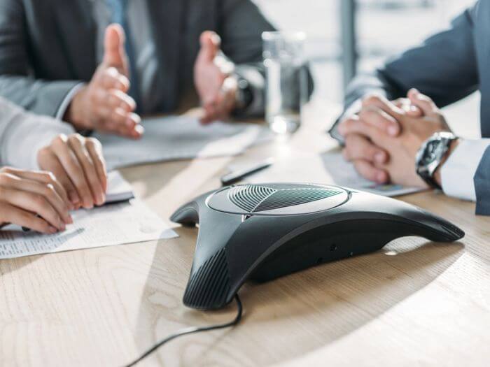 Three people on a work conference call