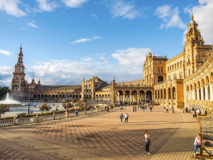 Tourists at the Plaza de Espana, Seville, Spain