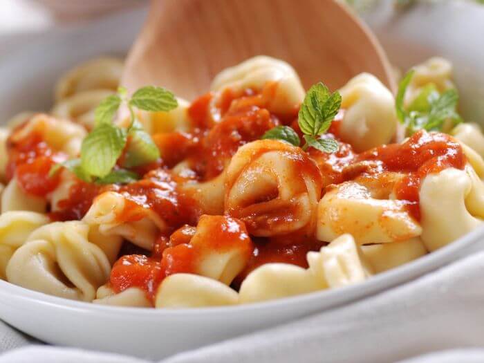 Traditional Italian dishes Tortellini with tomato sauce