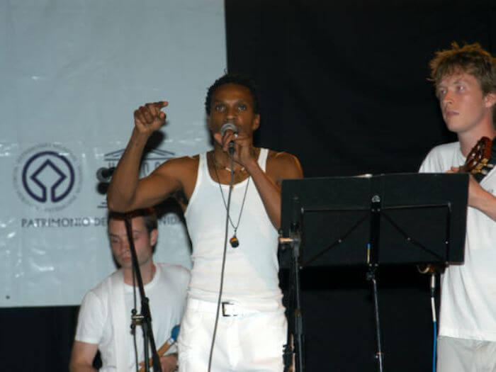 Olly Richards performing on stage in Brazil 