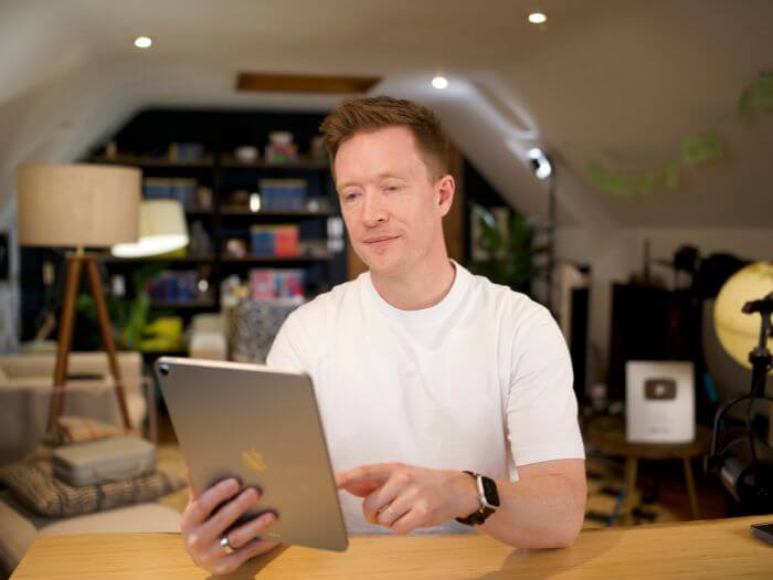 Olly Richards using tablet